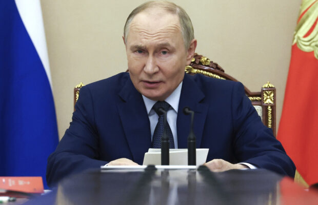 Putin says Russia will stick to nuclear arms limits for one more year after treaty with US expires Putin says Russia will stick to nuclear arms limits for one more year after treaty with US expires